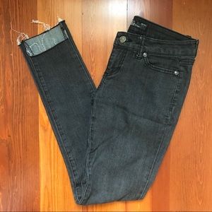 Faded black skinny jeans with cropped ankle